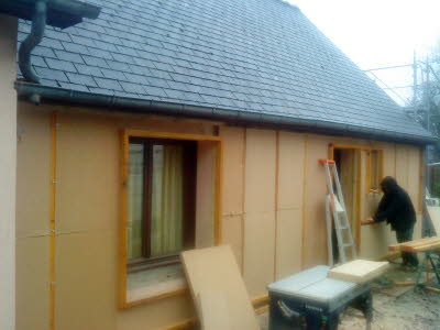 Isolation par pose d'un isolant en fibre de bois