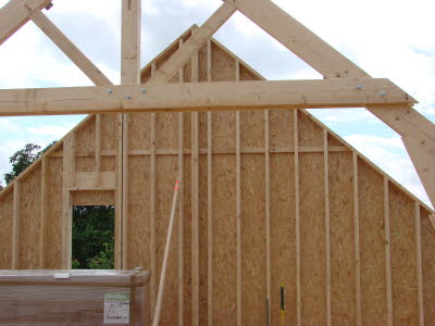 Les murs pignons sont aussi r�alis�s en ossature bois